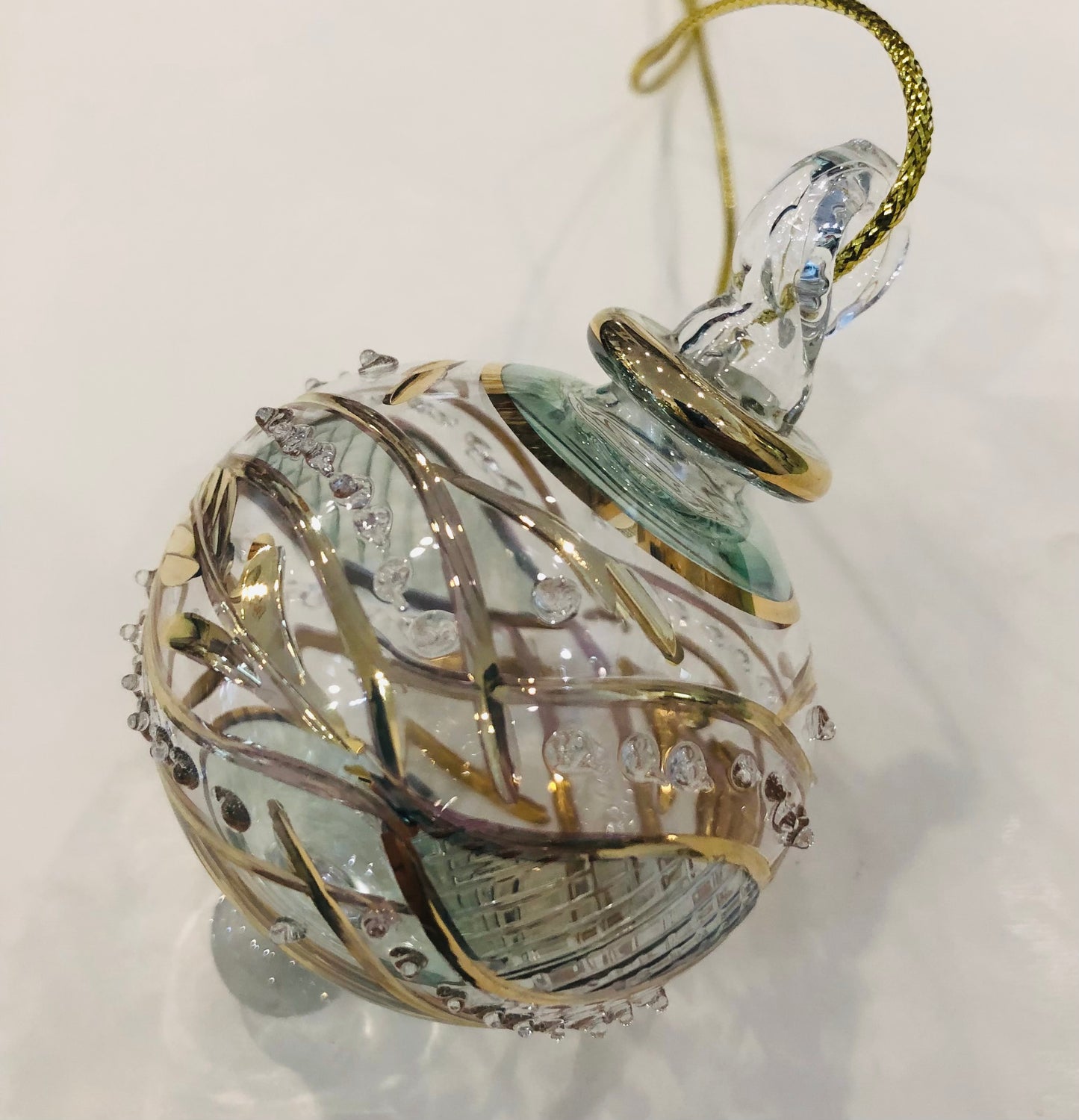 Blown Glass Ornament with Gold Garland and Green
